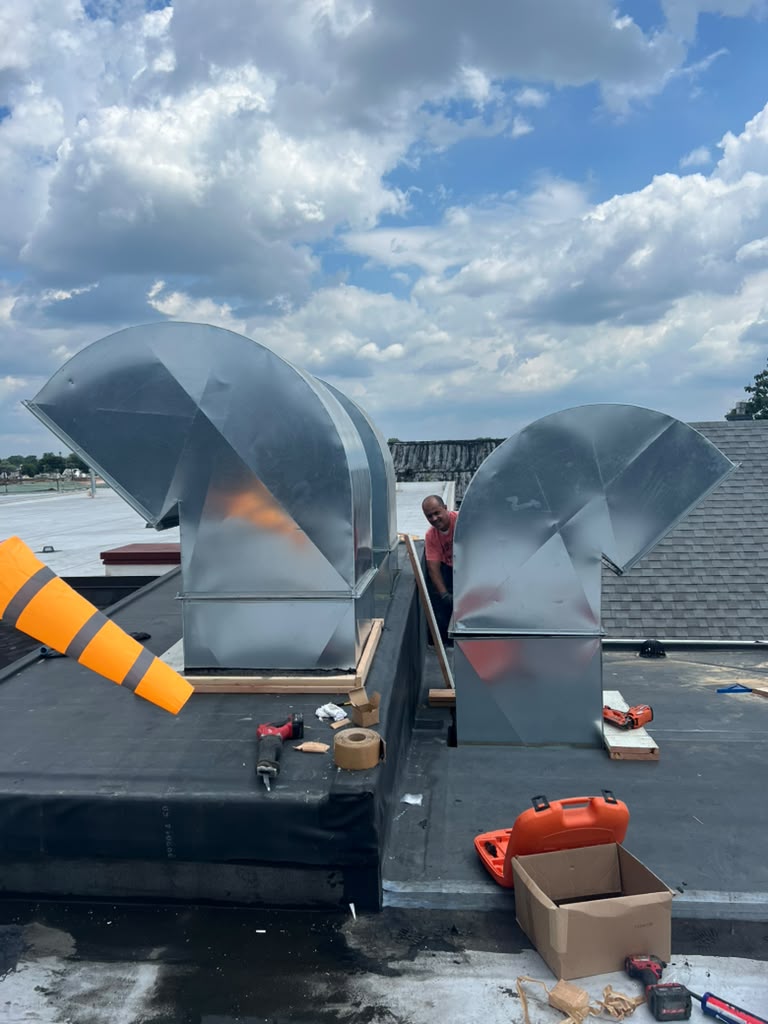 Two rooftop exhaust hoods fabricated and set by our technicians