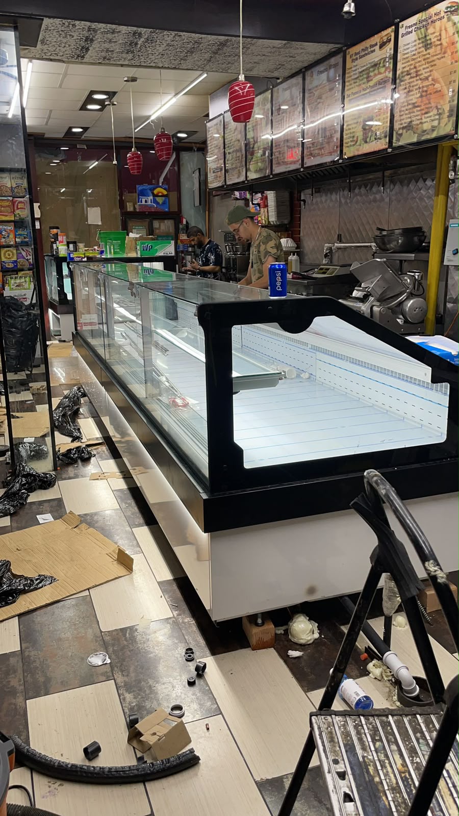 Refrigerated deli display case installed in a commercial kitchen