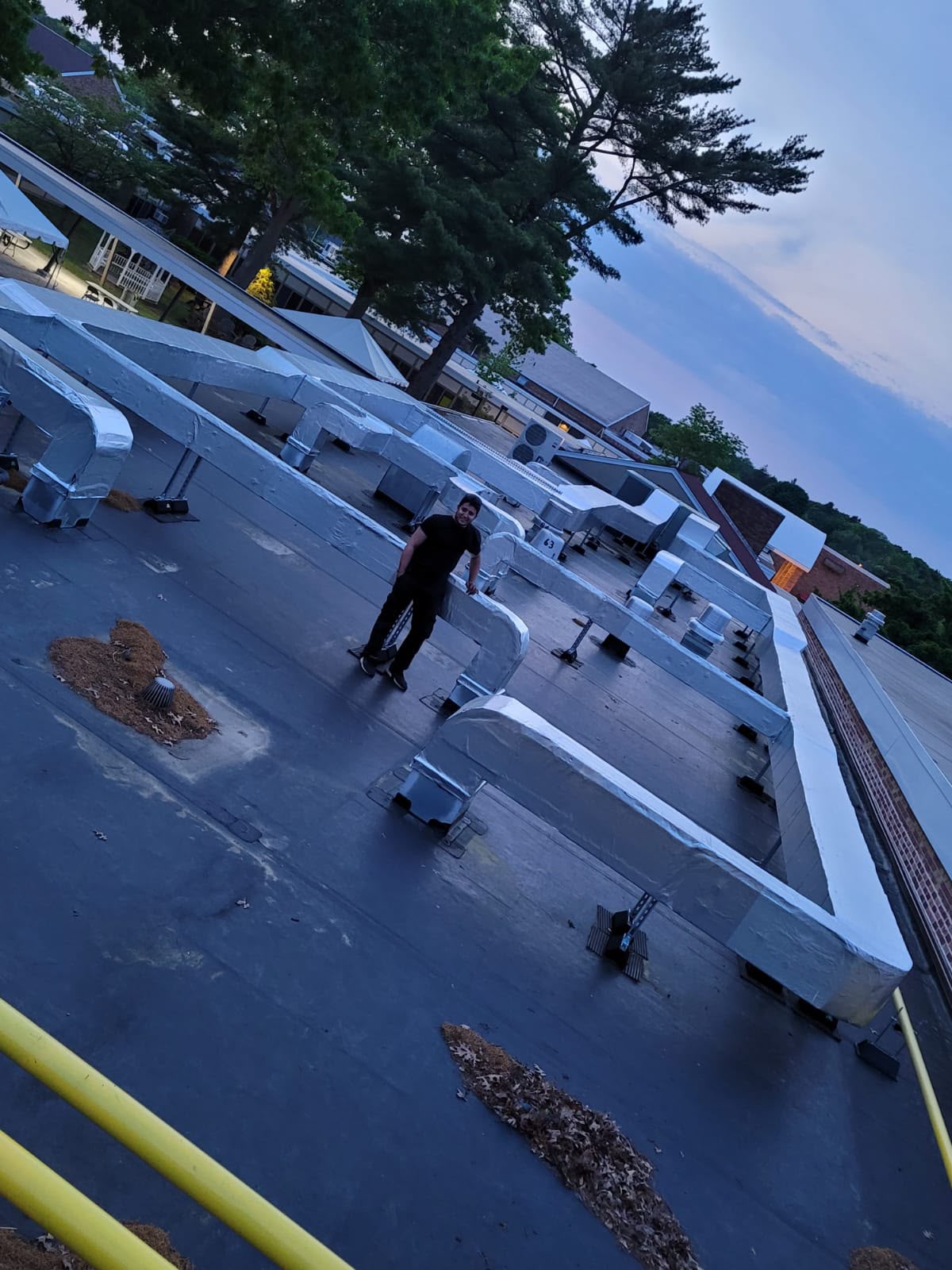 Insulated rooftop duct runs on a commercial building