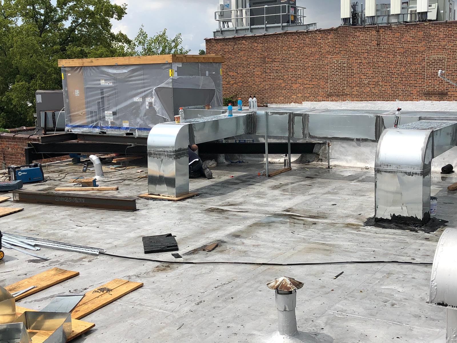 Rooftop package unit and custom sheet metal ductwork installation